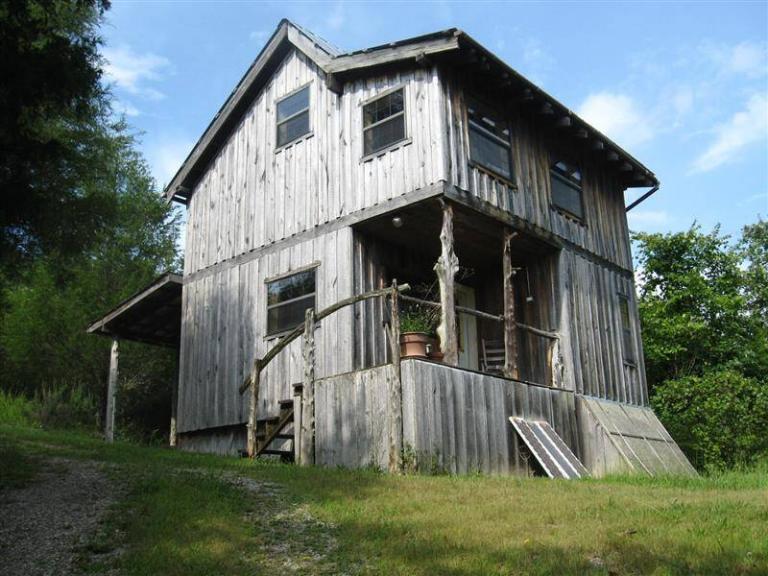exterior view of 2 story rustic cabin