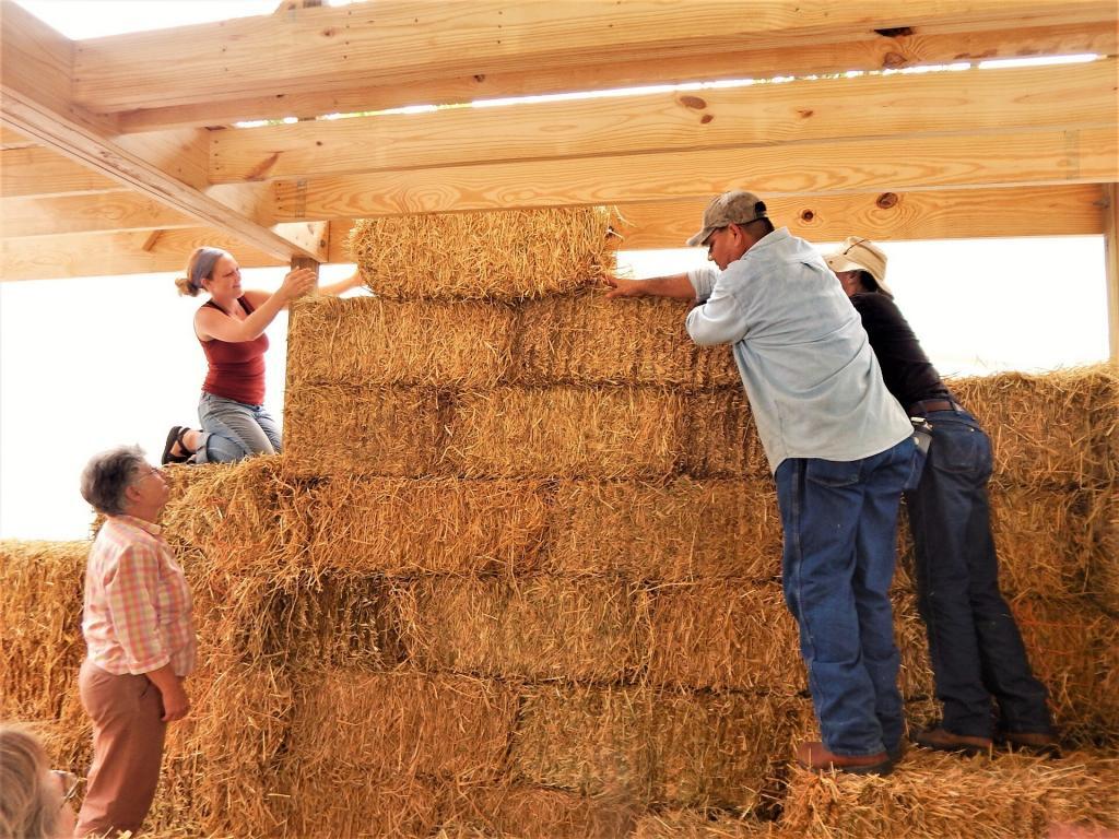building a wall with straw bales