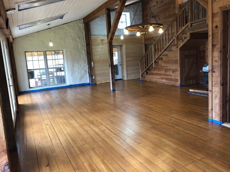 refinished floor Strawbale Lodge toward stairs